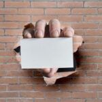 Print On business-card-hand-wall